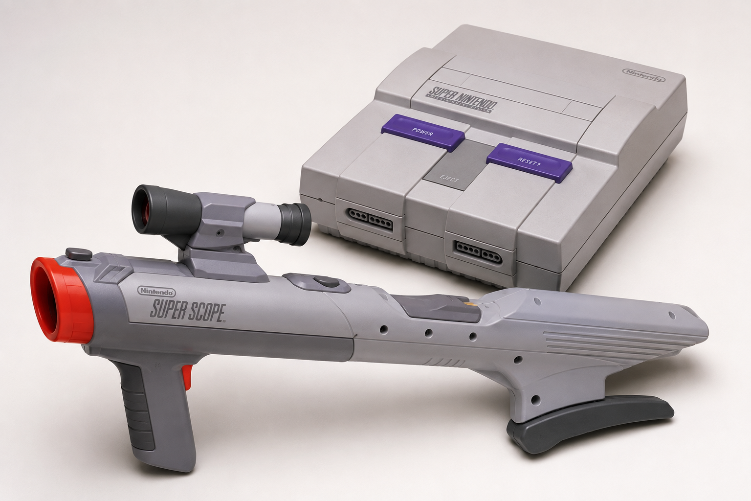Accessoire Super Scope posé à côté d'une Super Nintendo